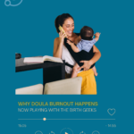 A woman talks on the phone while smiling, holding a baby and working in the kitchen.